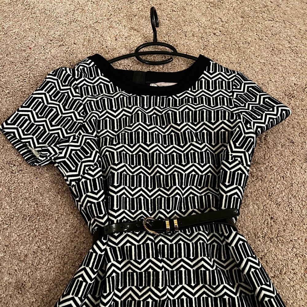 Banana Republic size 12, black and white with gold zipper on the backside.